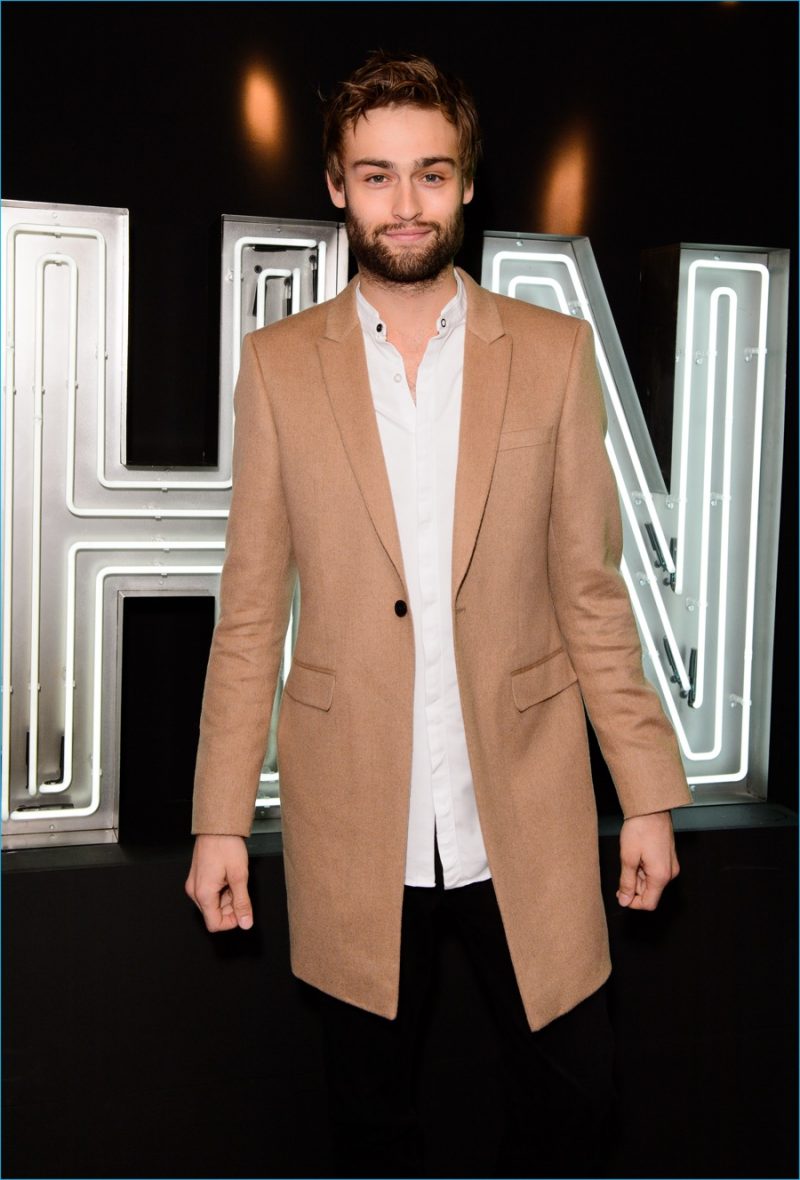 Douglas Booth attends Harvey Nichols' launch party.