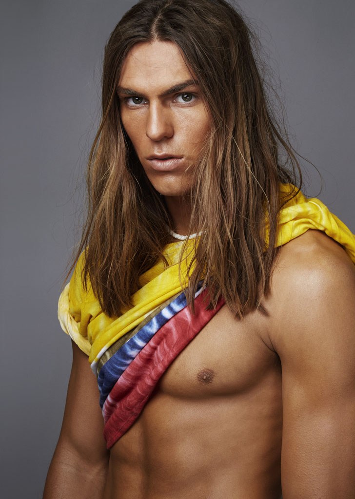 Travis Smith perfects his surfer look with grooming by Riad Azar.