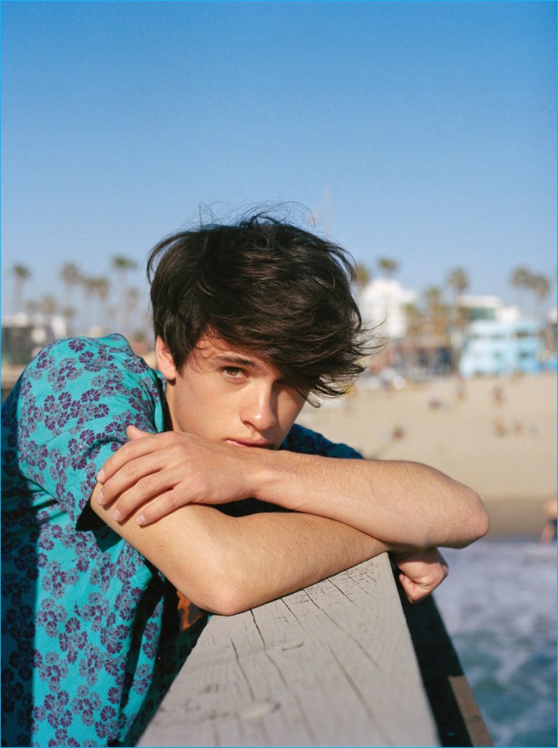 Dylan Jagger Lee wears a patterned short-sleeve shirt from Saint Laurent by Hedi Slimane.