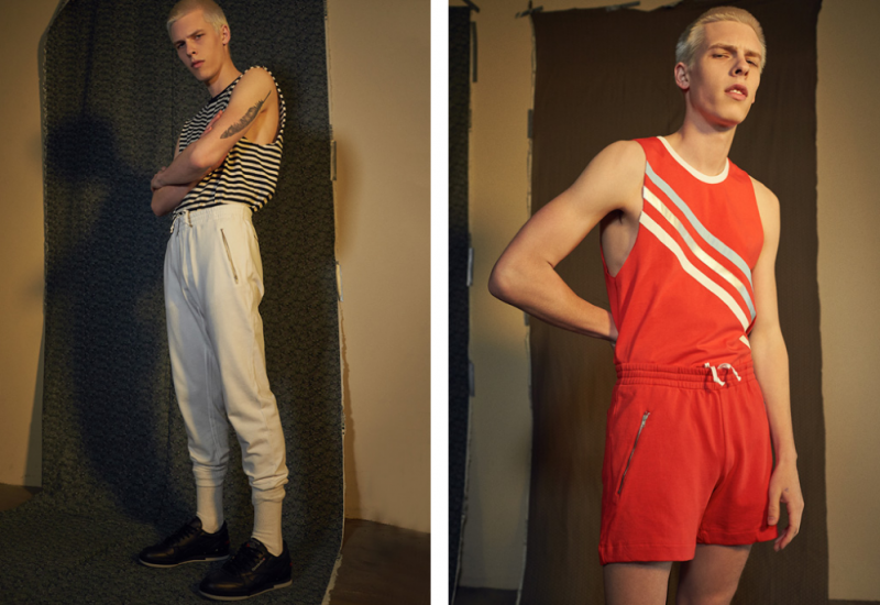 Left to Right: August wears striped sleeveless muscle tee R13, sweatpants Gosha Rubchinskiy and sneakers Gosha Rubchinskiy x Reebok Classic. August wears red tank and cotton shorts Gosha Rubchinskiy.