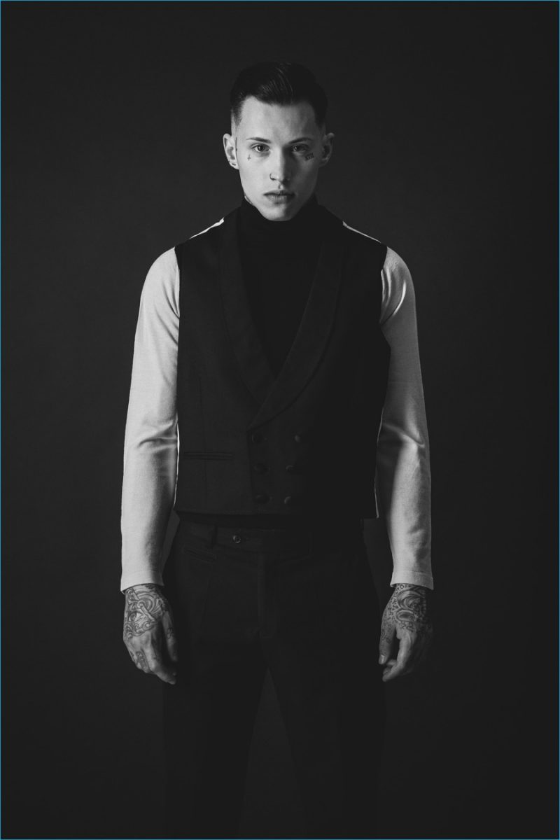 Ryan wears waistcoat Stephen Williams, turtleneck sweater Hardy Amies and trousers Prada.