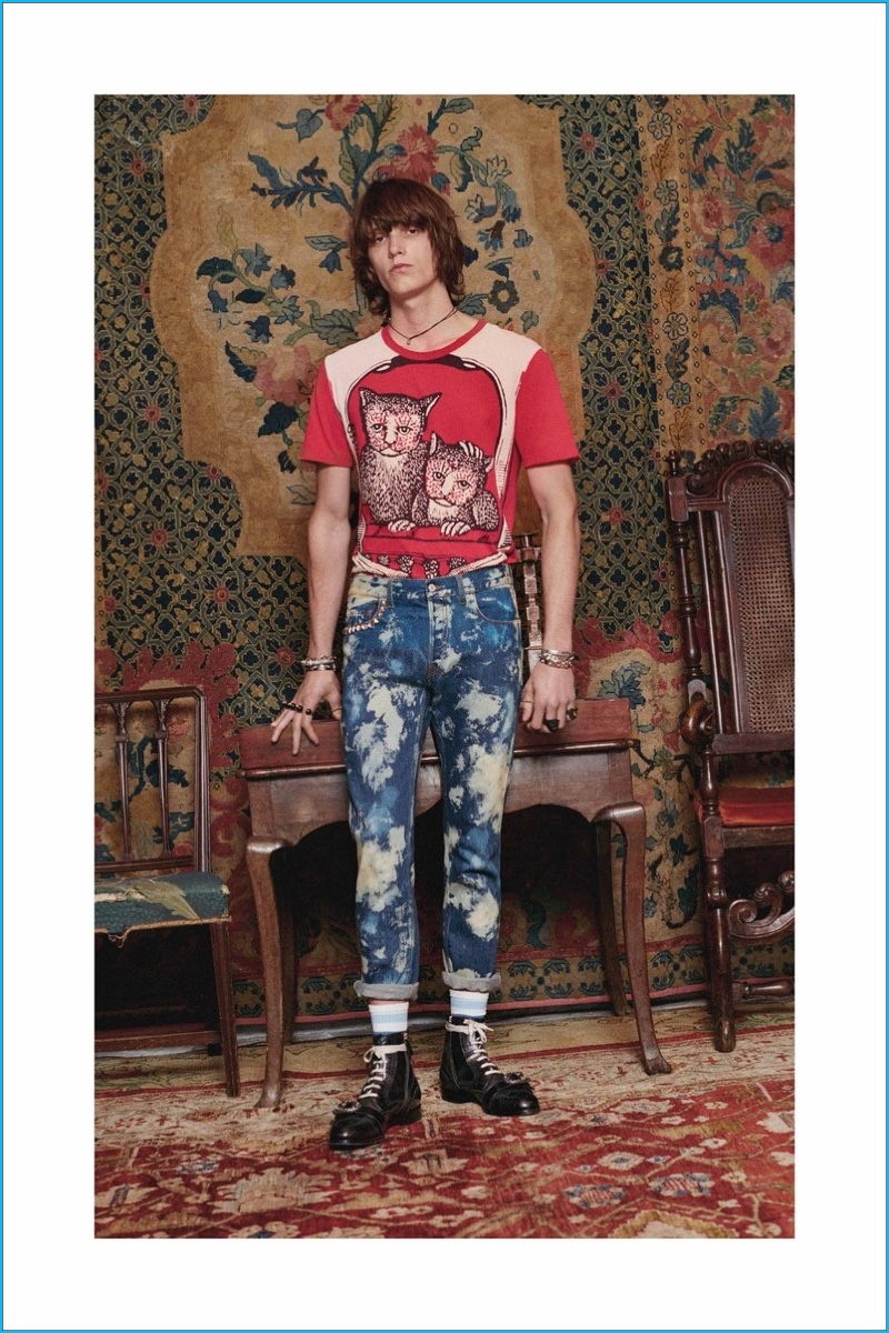 Gucci continues its kitschy approach to fashion with eccentric graphics that decorate pieces such as t-shirts.