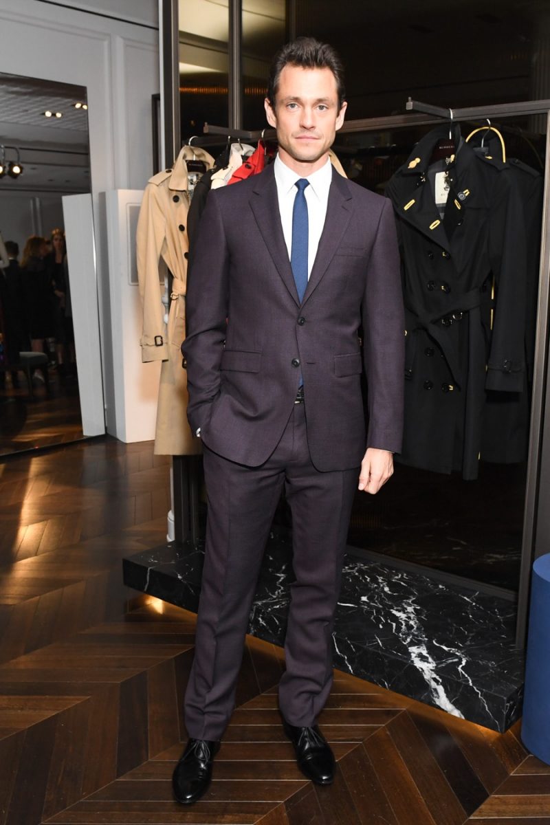 Actor Hugh Dancy is a sartorial figure in Burberry suiting.