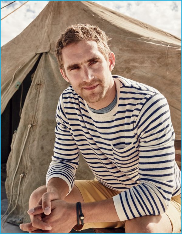 Will Chalker pictured in J.Crew's textured striped cotton crewneck sweater and Stanton shorts.