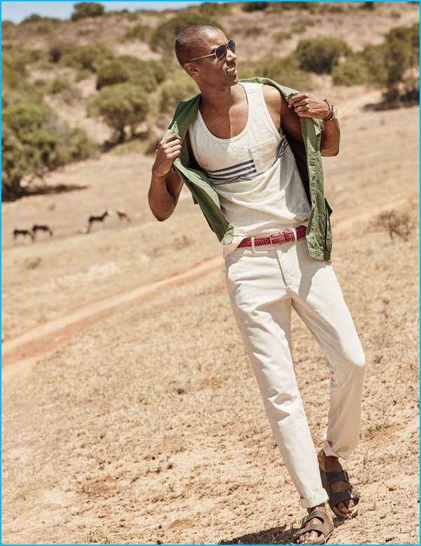 Claudio Monteiro channels summer style in a J.Crew pocket tank, stretch chinos, a short-sleeve shirt and sunglasses.