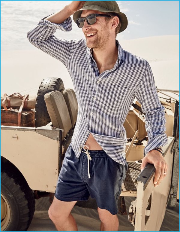 Will Chalker wears J.Crew drawstring dock shorts with a striped button-down shirt.