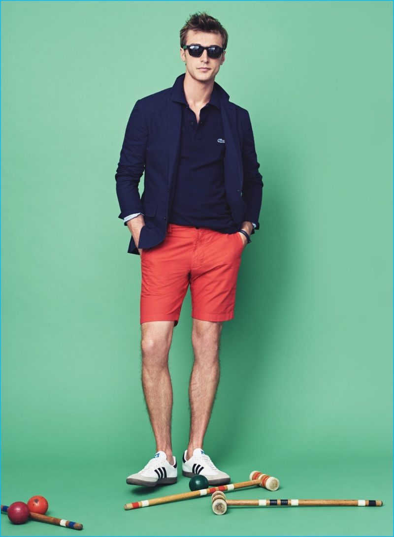 Everyday Style: Clément Chabernaud wears J.Crew Ludlow summerweight cotton-linen blazer in coastline navy, Lacoste for J.Crew polo shirt, 9" Stanton shorts, Adidas Samba sneakers, Caputo & Co. leather snap bracelet and Irving sunglasses.