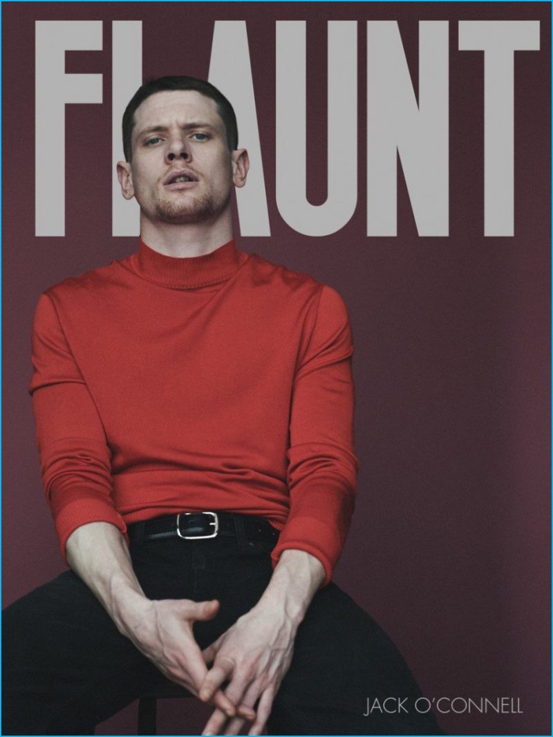 Jack O'Connell covers the most recent issue of Flaunt magazine in a Tom Ford sweater and belt with Cult of Individuality jeans.