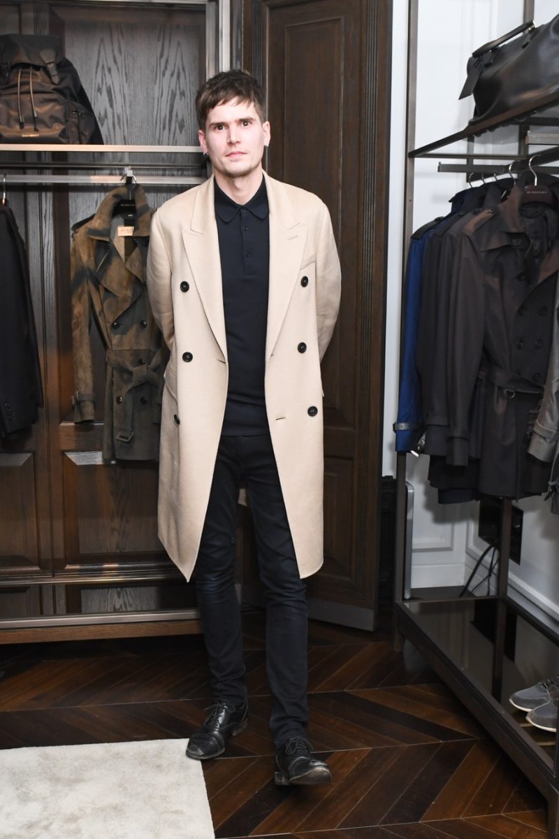 Model turned DJ Jamie Burke in a Burberry double-breasted coat.