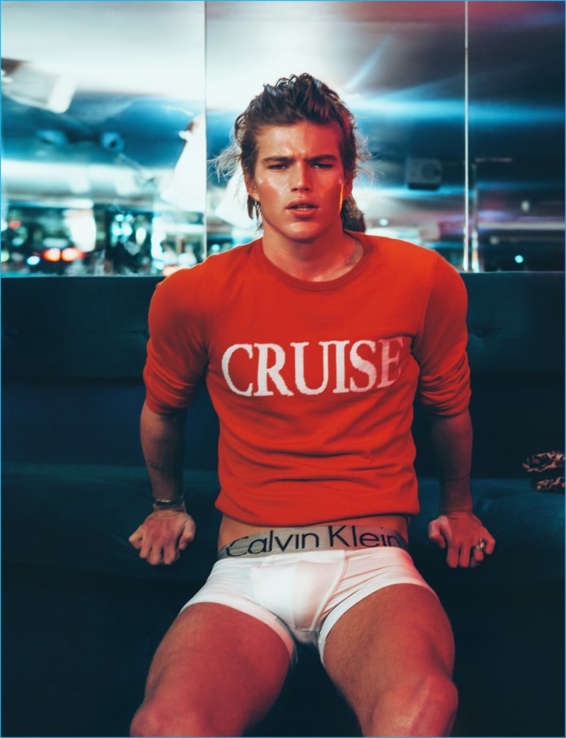 Jordan Barrett poses for a cheeky image in a Cruise top and Calvin Klein underwear.