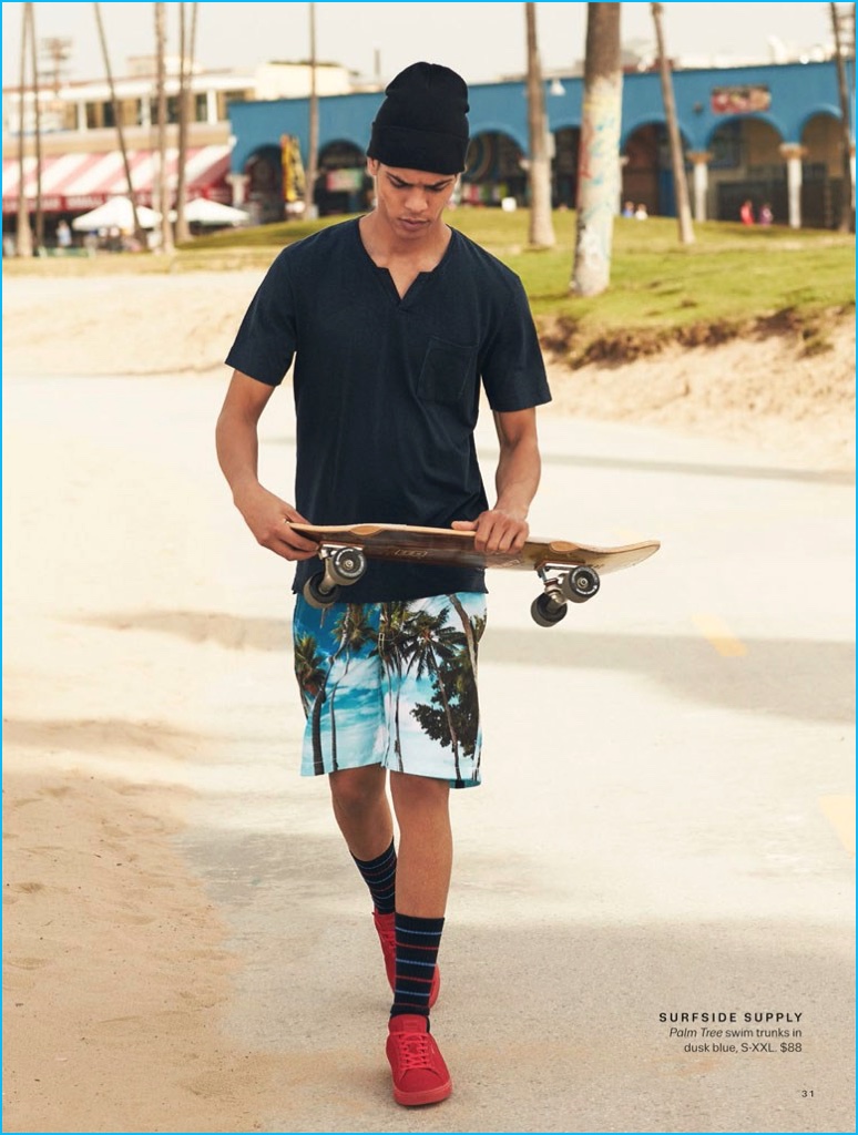 Geron McKinley channels a skater ease in Surfside Supply swim trunks.