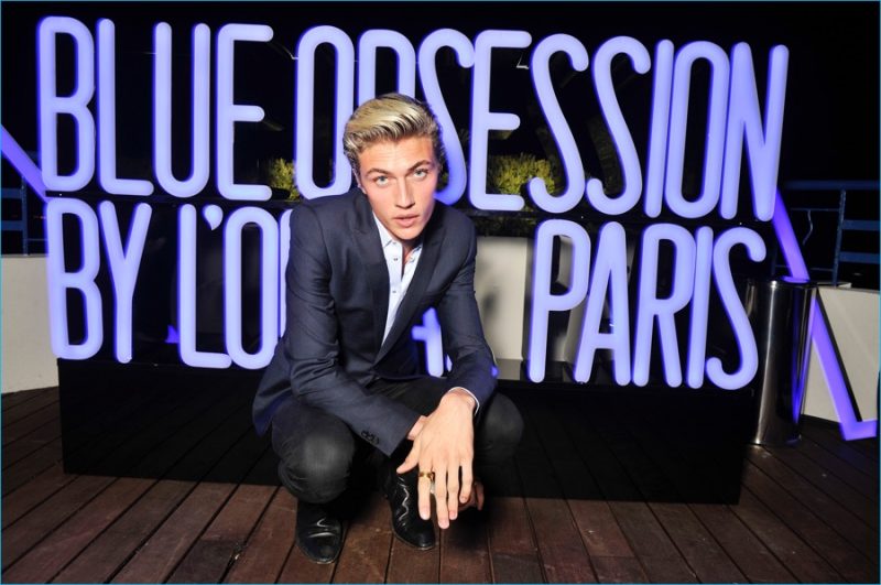 Lucky Blue Smith poses for pictures at the L'Oreal Paris Blue Obsession Party during the 2016 Cannes Film Festival.