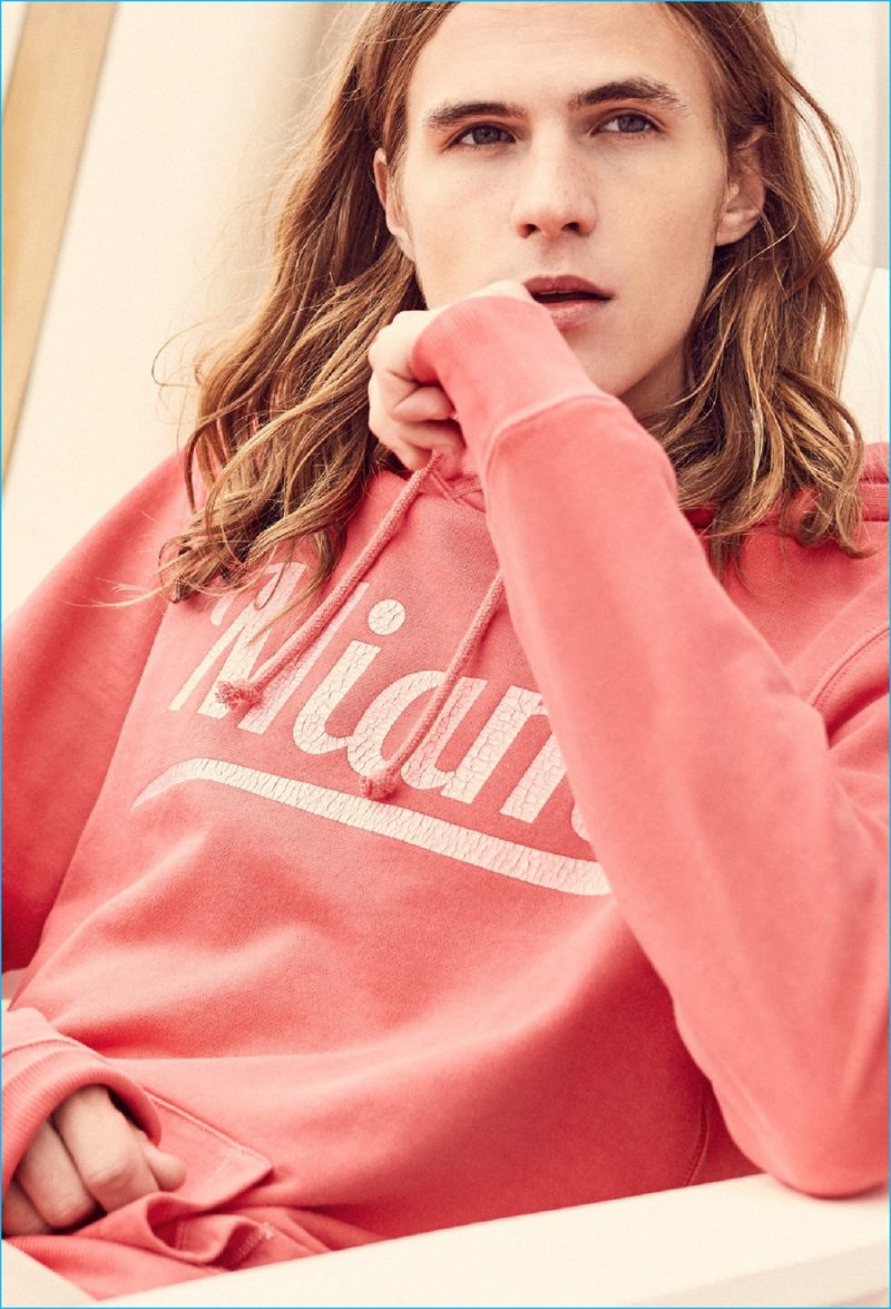 Malcolm Lindberg goes casual in a Miami hooded sweatshirt from Mango.