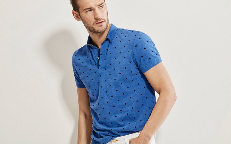 Dan Murphy models a polka dot polo shirt from Massimo Dutti.