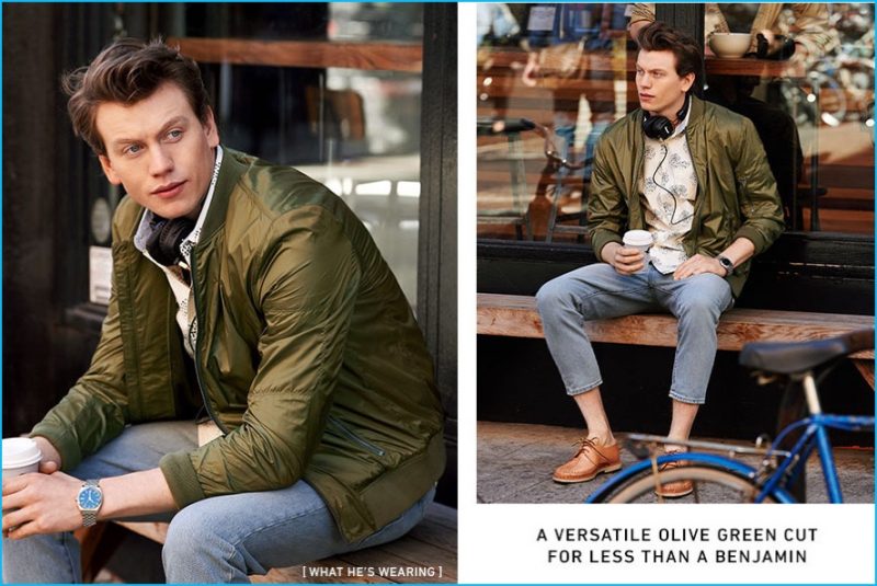 Sid Ellison sports an olive green bomber jacket from Calvin Klein