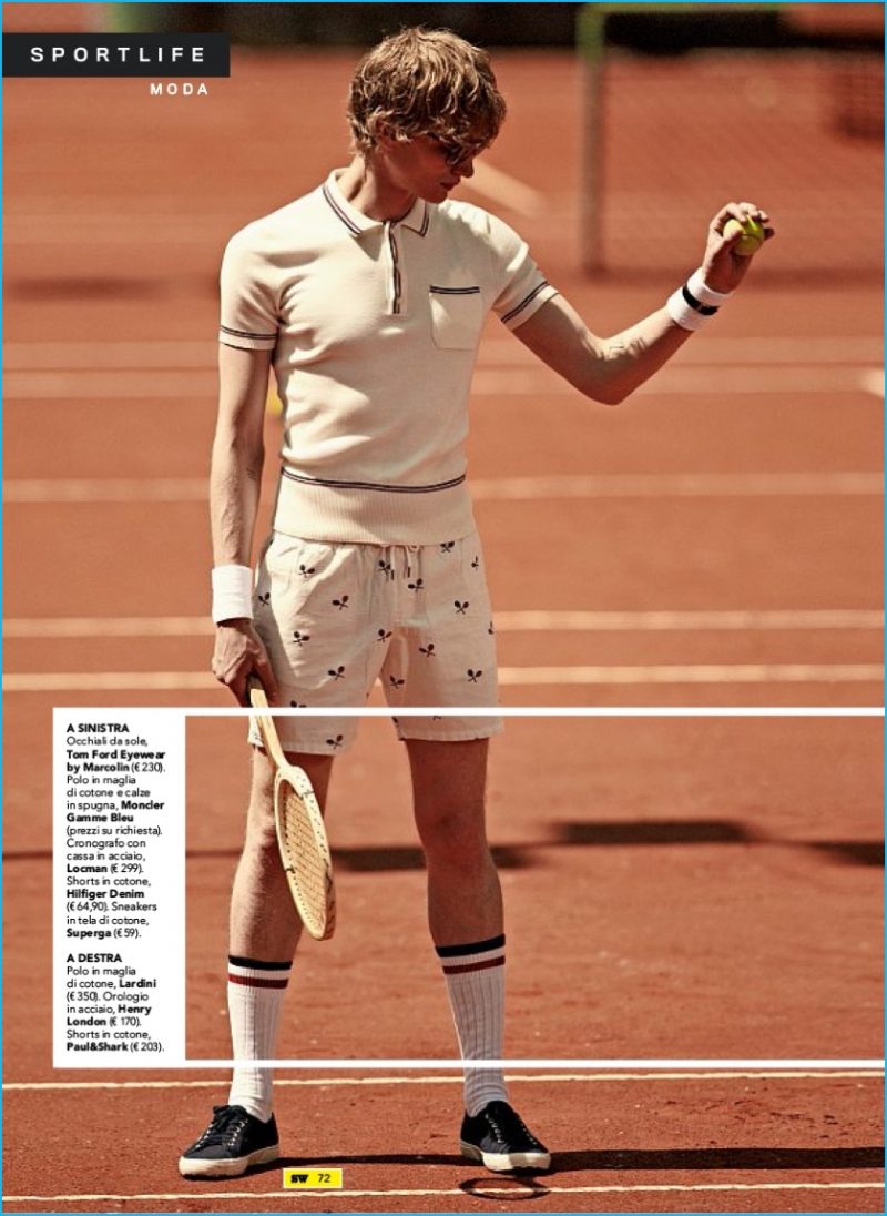 Paul Boche is a preppy vision in a Moncler Gamme Bleu top, paired with Hilfiger Denim shorts.