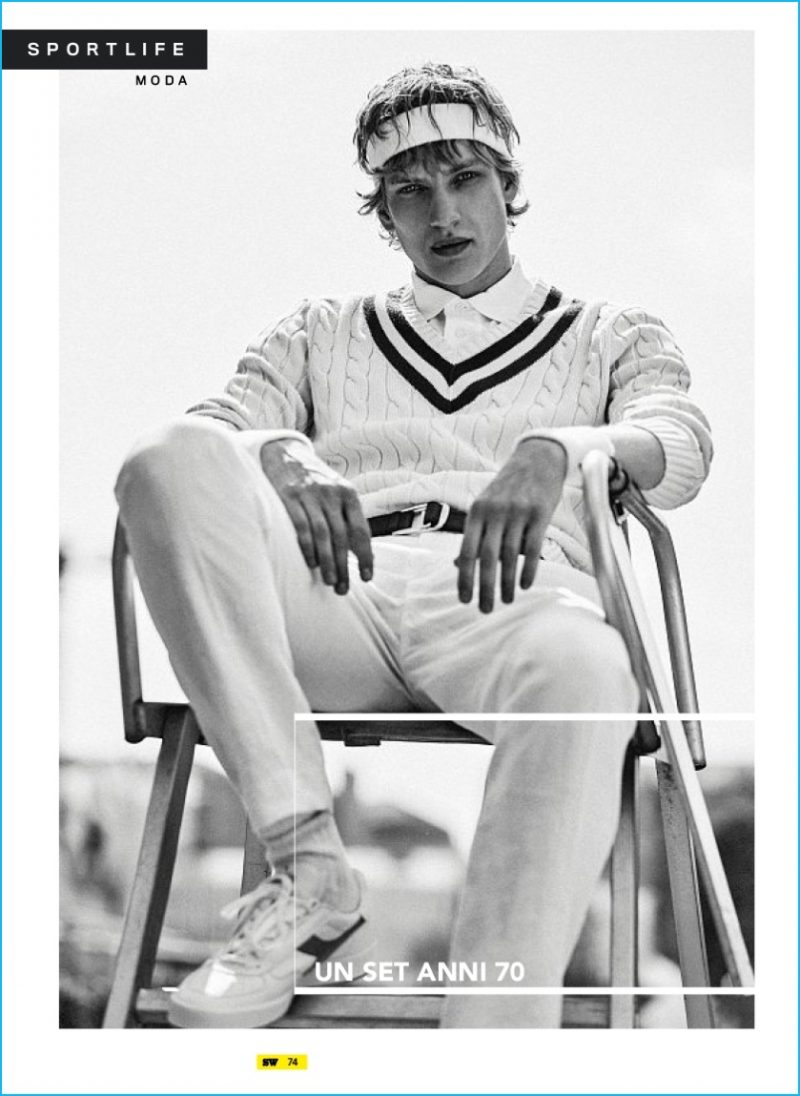 Paul Boche is pictured in a Polo Ralph Lauren sweater with Brioni trousers.