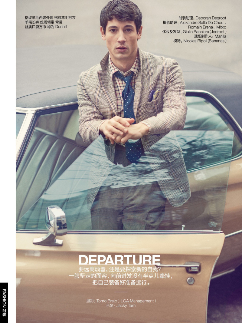 Nicolas Ripoll models plaid tailoring ensemble from Dunhill for GQ China.