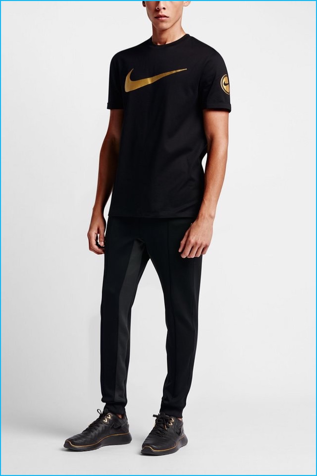 Olivier Rousteing x Nike look featuring a logo t-shirt and slim-cut joggers.