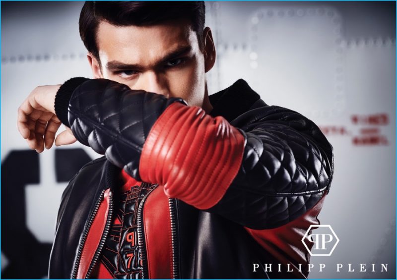 Filip Hrivnak rocks a red and black leather moto jacket from Philipp Plein's pre-fall 2016 collection.