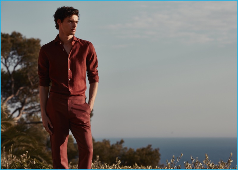 Hannes Gobeyn is a bold standout in a red shirt and trousers from Reiss.