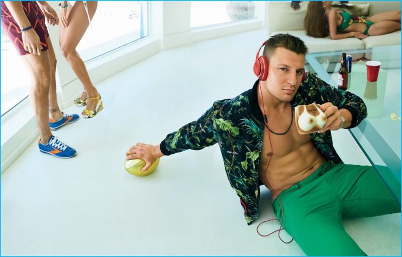 Rob Gronkowski goes for a tropical statement in a Gucci bomber jacket.