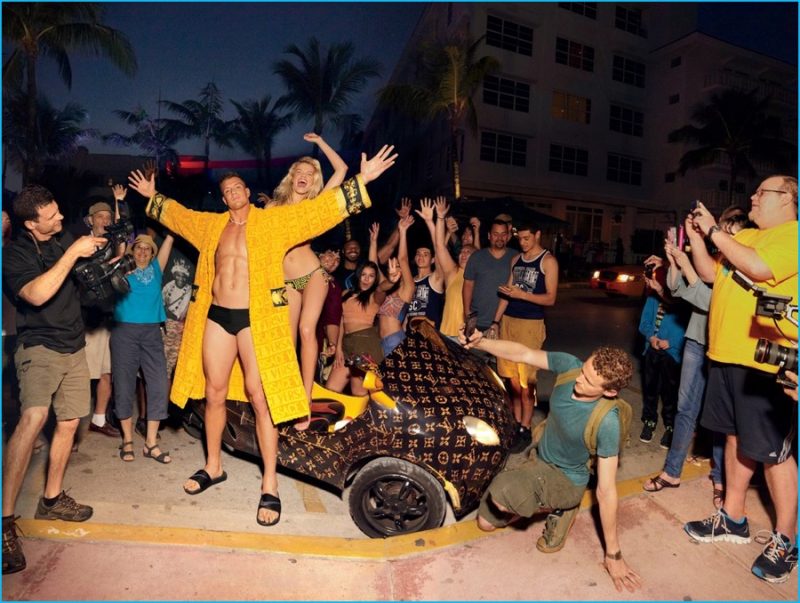 Photographed for the pages of GQ, Rob Gronkowski rocks a bright yellow robe from Versace.