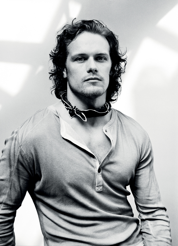 Styled by Phoebe Arnold, Sam Heughan dons a henley from Belstaff with a Drake's neckerchief. 