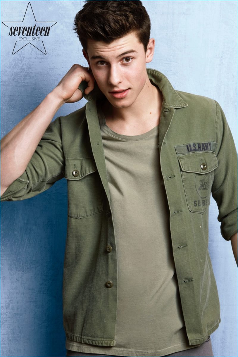 Shawn Mendes embraces military style in an army green shirt.