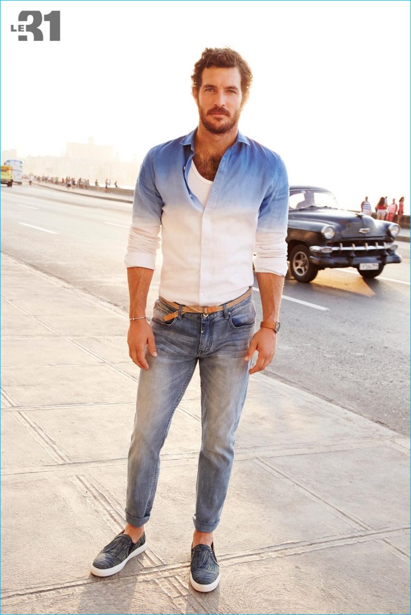 Justice Joslin embraces the dip-dye trend with a must-have shirt, paired with distressed denim jeans.