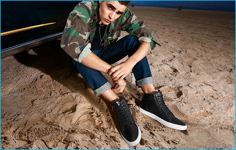 Diego Villarreal pictured in Steve Madden high-top sneakers.