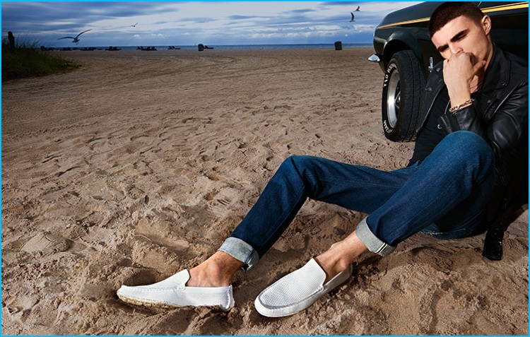 Diego Villarreal takes to the beach for Steve Madden, wearing white loafers.