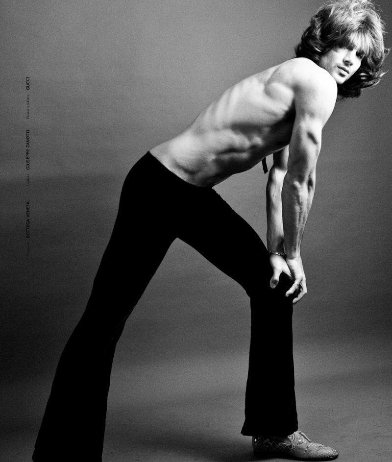 Taner Sigirtmac stretches in Bottega Veneta trousers.