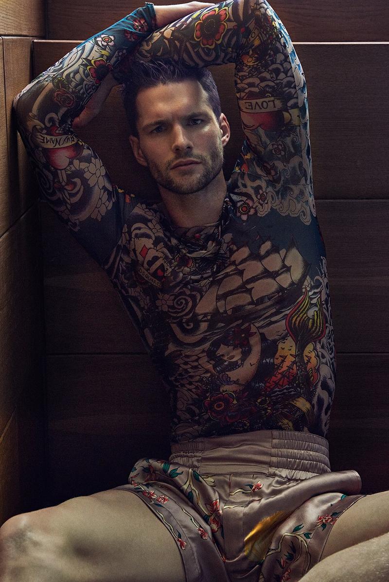 Tomas Skoloudik rocks a tattoo long-sleeve top from Dsquared2.