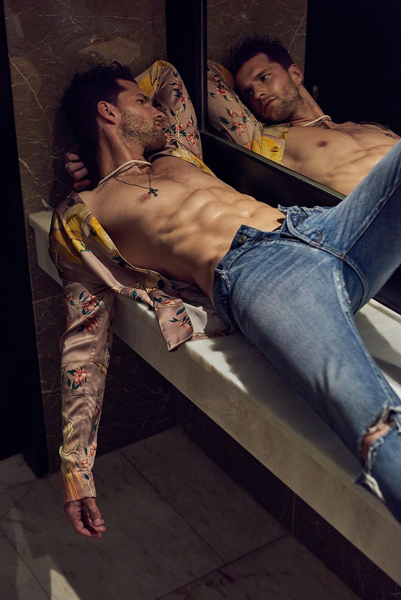 Tomas Skoloudik relaxes in a patterned Louis Vuitton top.
