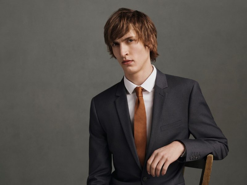Topman goes traditional with a slim-cut tailored suit and fitted dress shirt with tie.