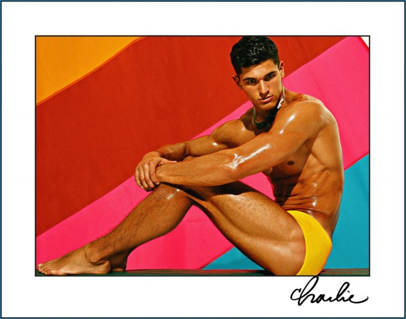 Trevor Signorino is front and center in a yellow swimsuit from Charlie by Matthew Zink.