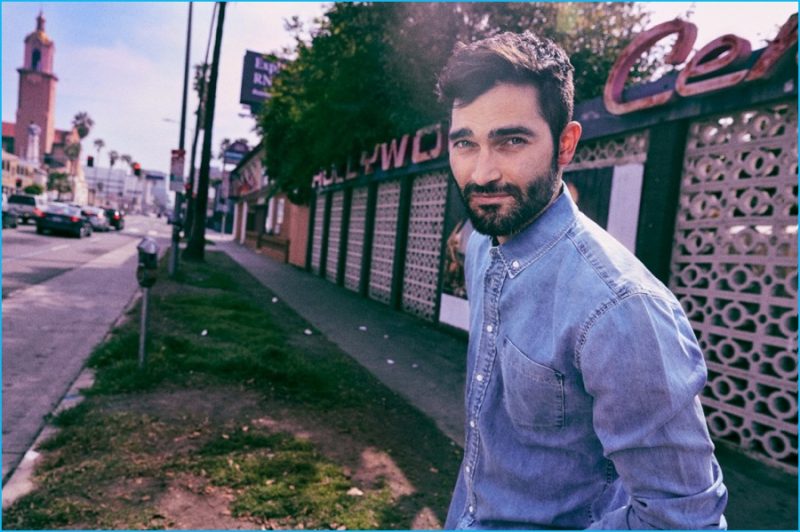 Tyler Hoechlin pictured in a denim shirt from Sandro.