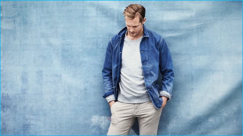 Alexander Skarsgård wears denim jacket Chimala, sweatshirt Rag & Bone and chinos Incotex.