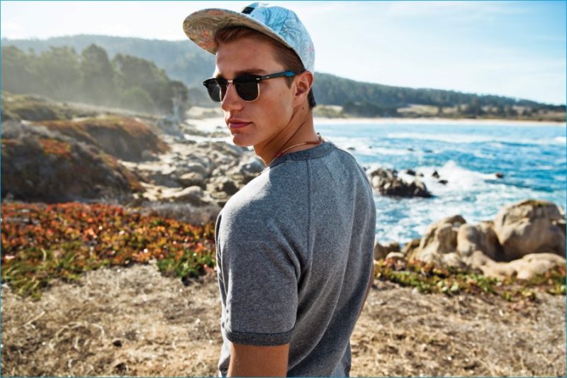 A cap and sunglasses contribute to a young spin on leisure style from American Eagle.