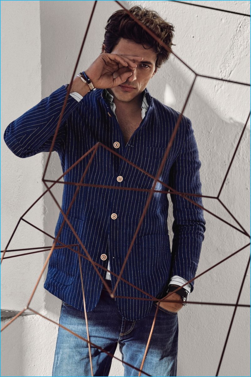 Andres Velencoso Segura gravitates towards pinstripe tailoring for Massimo Dutti.