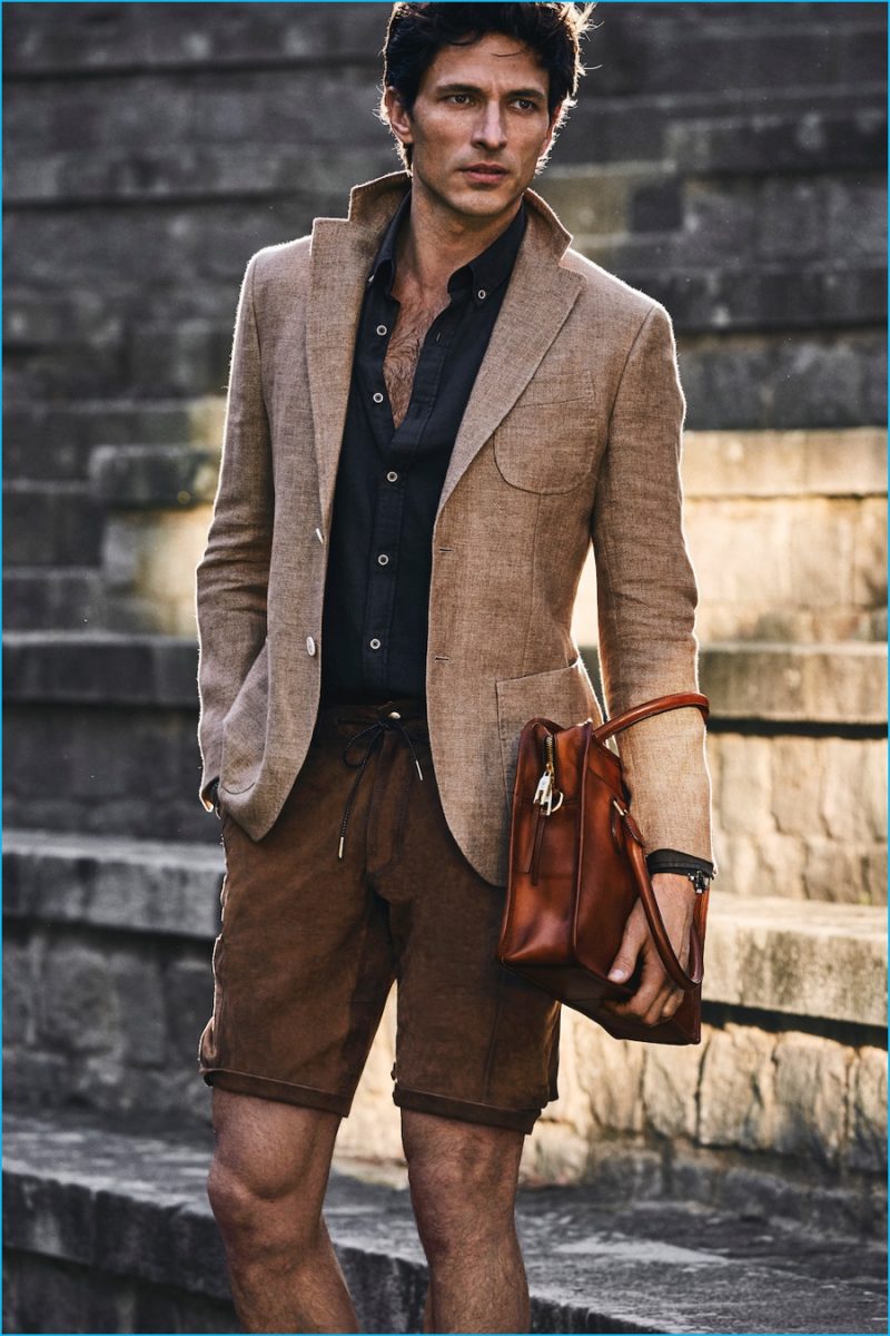 Andres Velencoso Segura wears chic shorts with a linen blazer from Massimo Dutti.