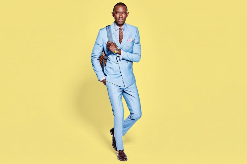 Armando Cabral dons a light blue double-breasted suit for a GQ photo shoot.