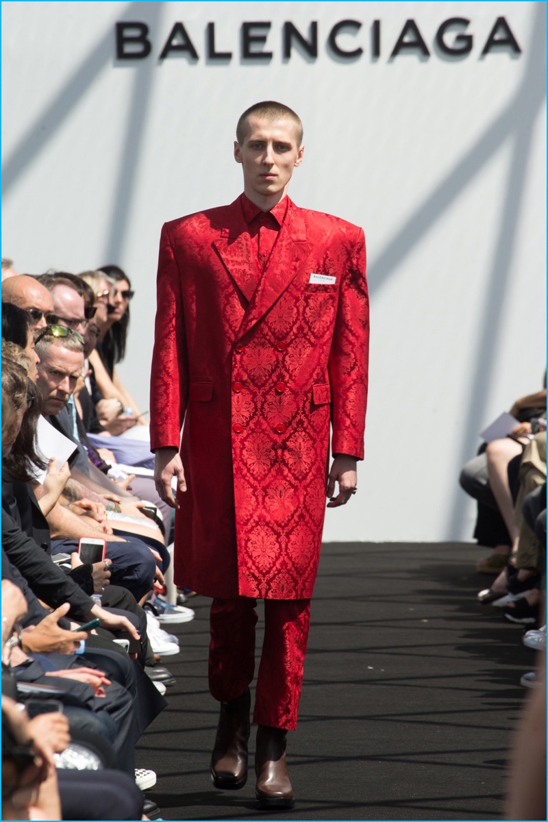 Balenciaga adds a pop of color for spring-summer 2017, turning out a red brocade look.