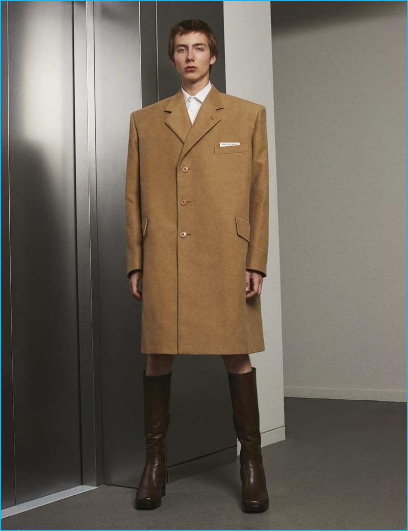 Paul Hameline wears Balenciaga's boxy, oversized camel coat for spring-summer 2017.