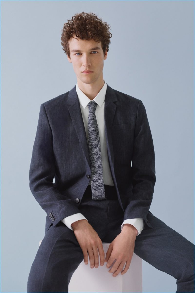 COS approaches chic summer suiting in lightweight wool.