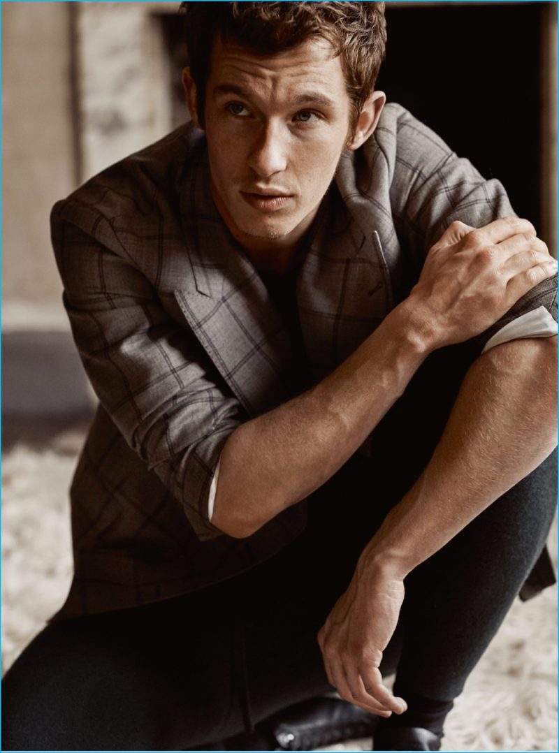 Callum Turner embraces checks in a Dries Van Noten jacket.