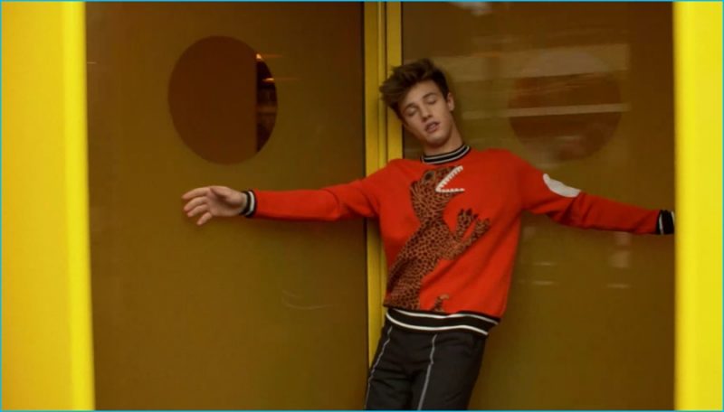 Cameron Dallas charms in a graphic sweater from Paul Smith.