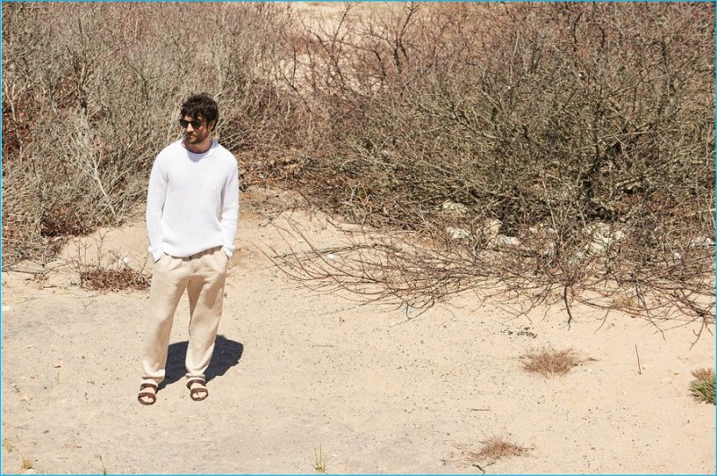 Cedric Bihr wears Club Monaco rib stitch roll neck, Delave beach pants and ancient Greek Geneos sandals.