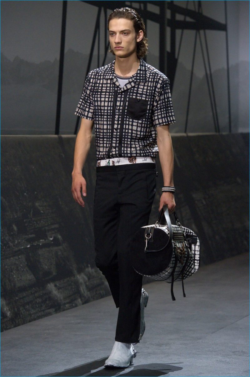 Coach has another striking print moment with a paint like grid pattern that dresses both shirts and trousers.